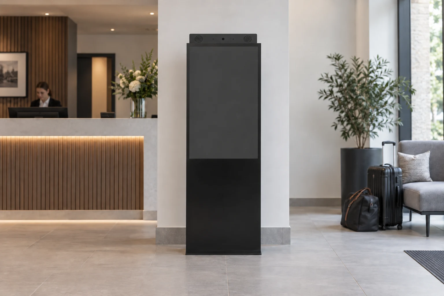 Illustrative hospitality installation with a front-facing Versi Indoor / freestanding. Communication bar directly on the display chassis.
